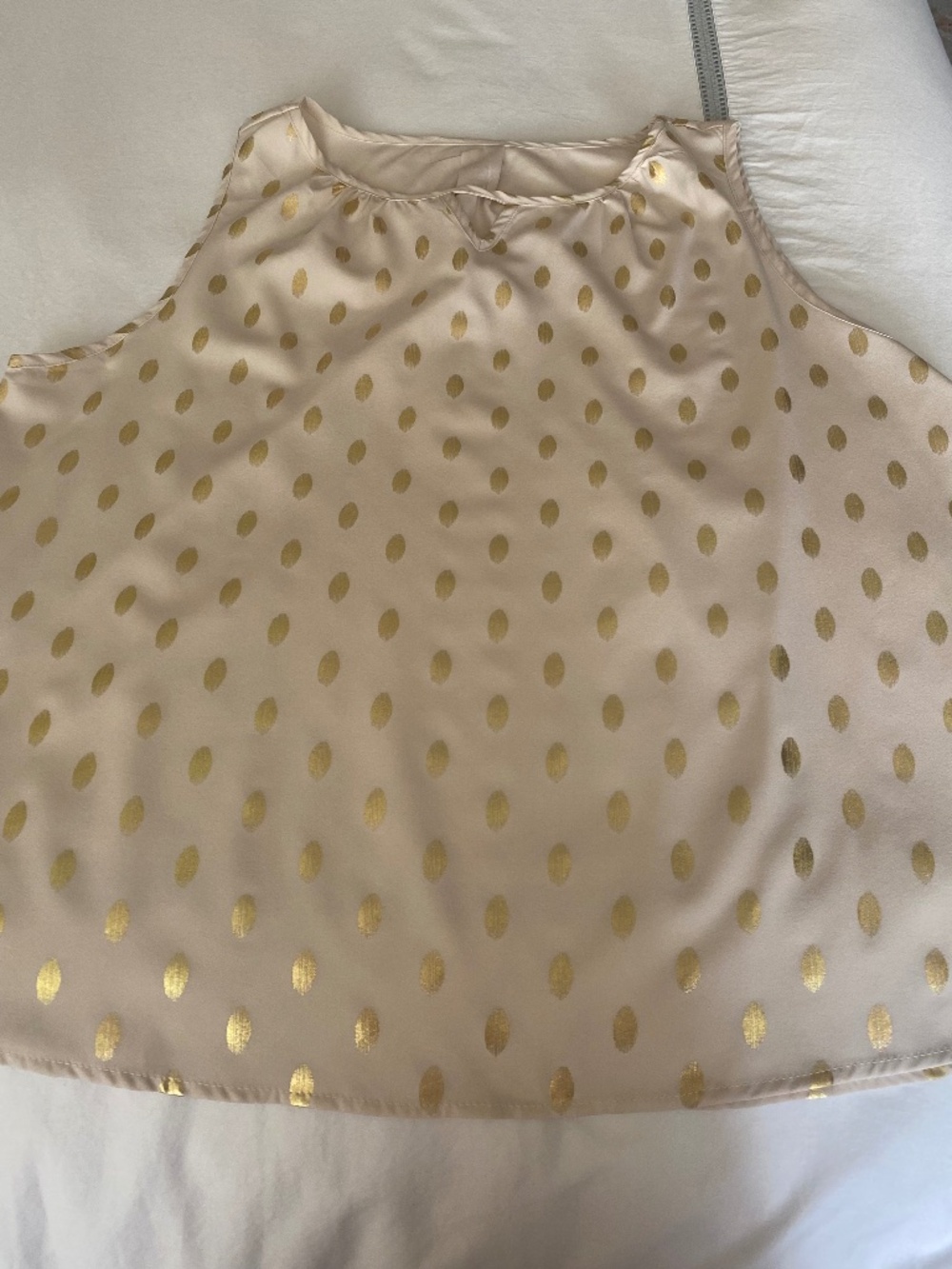 Woman's sleeveless blouse with gold print